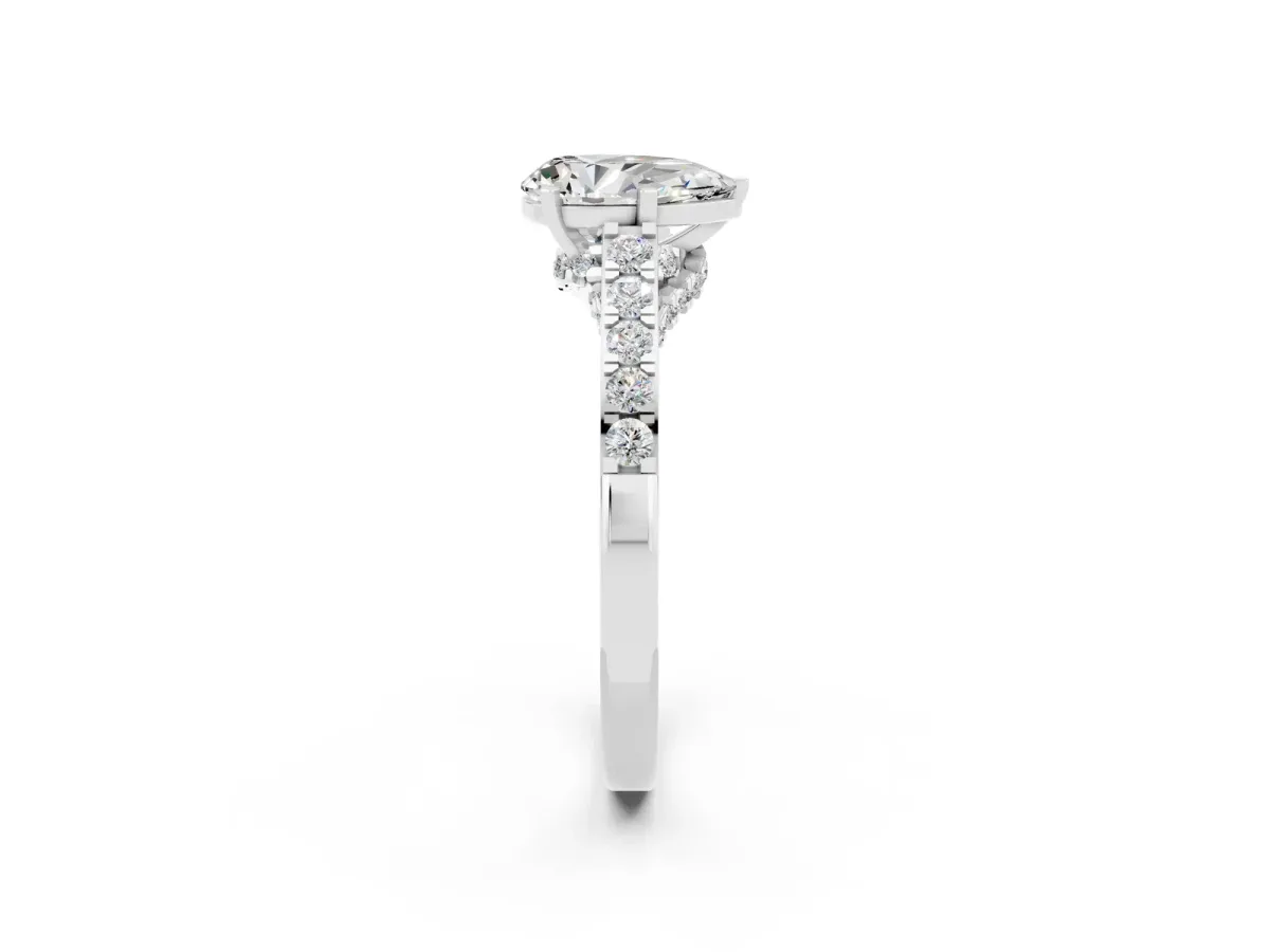 Pear Cut Moissanite Solitaire Ring with Crossover Gallery and Round Pavé Band Silver