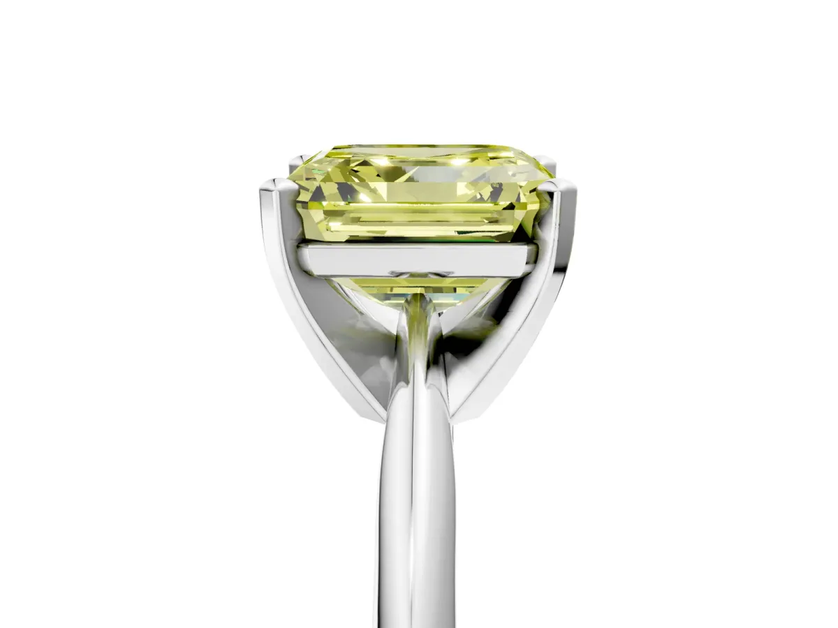 Fancy Yellow Asscher Cut Cut Solitaire Ring with Four-Prong Setting on a Classic Band Platinum