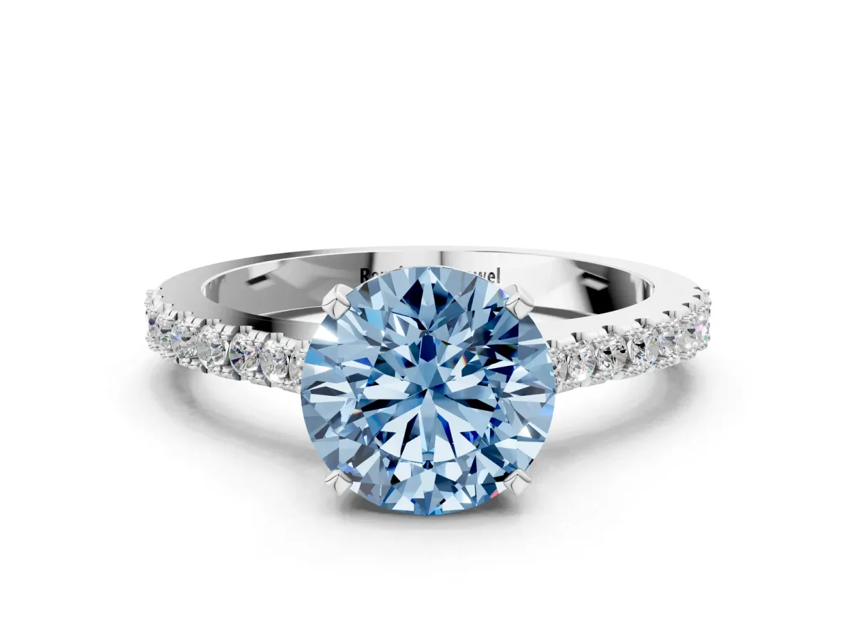 Fancy Blue Round Cut Cut Solitaire Diamond Engagement Ring with Pave Band and Four-Prong Setting Silver