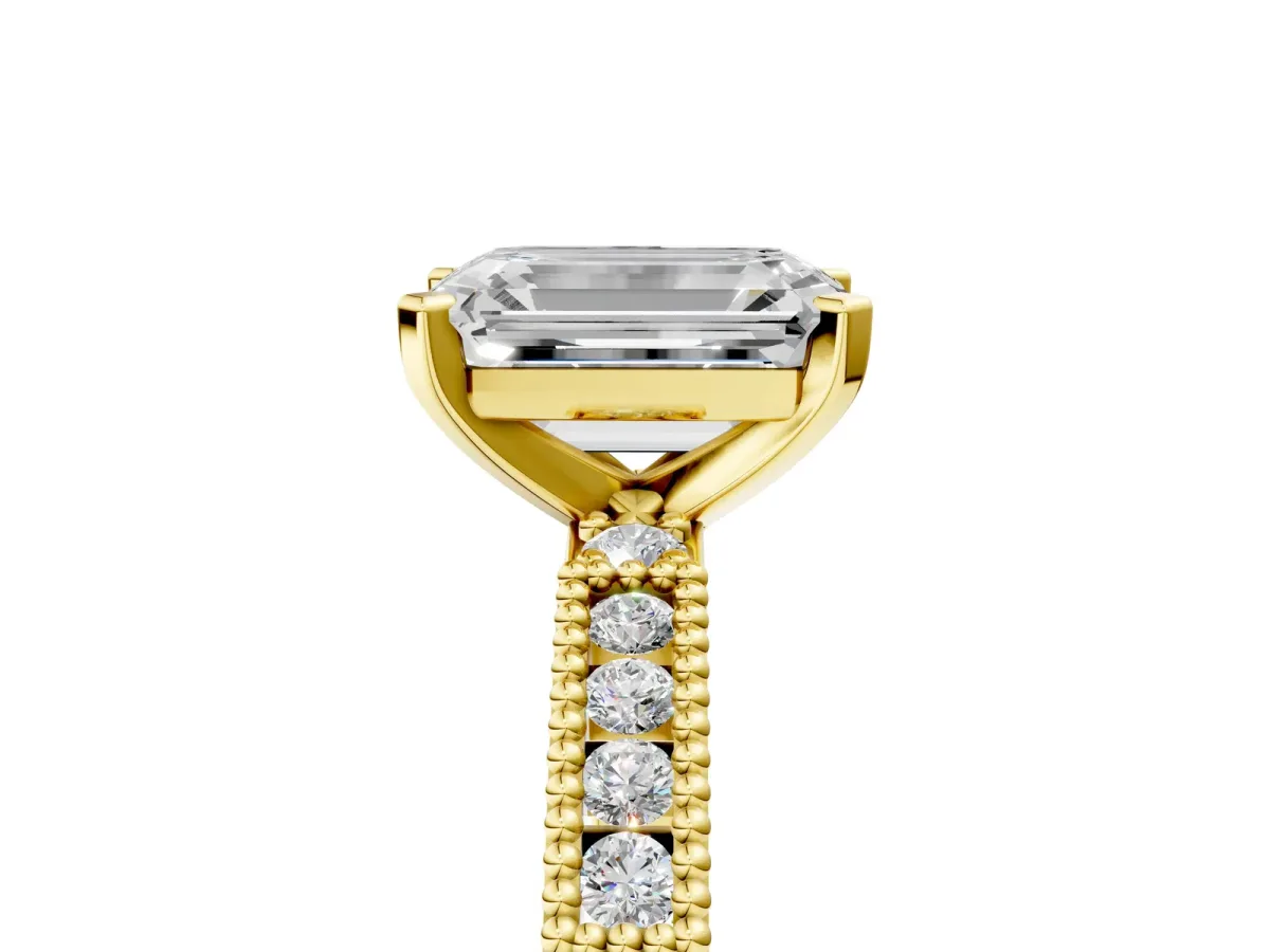 Emerald Cut Solitaire with Pavé Band and Four-Prong Setting Yellow gold