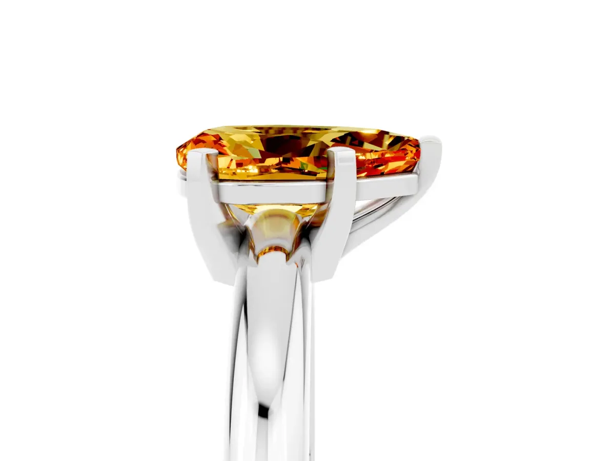 Pear Cut Citrine Solitaire Engagement Ring with Round Band and Four-Prong Setting Silver