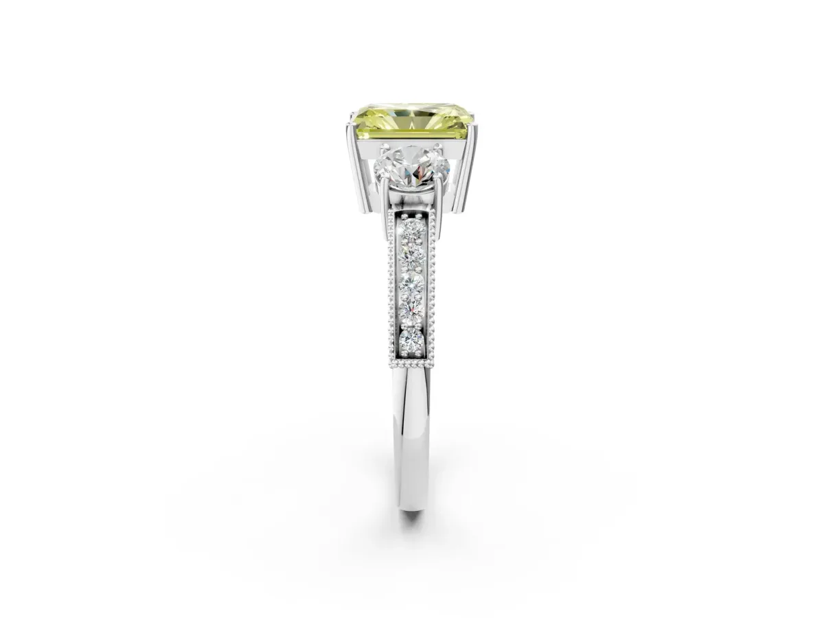 Fancy Yellow Radiant Cut Three-Stone Diamond Ring with Pavé Band and Four-Prong Setting Platinum