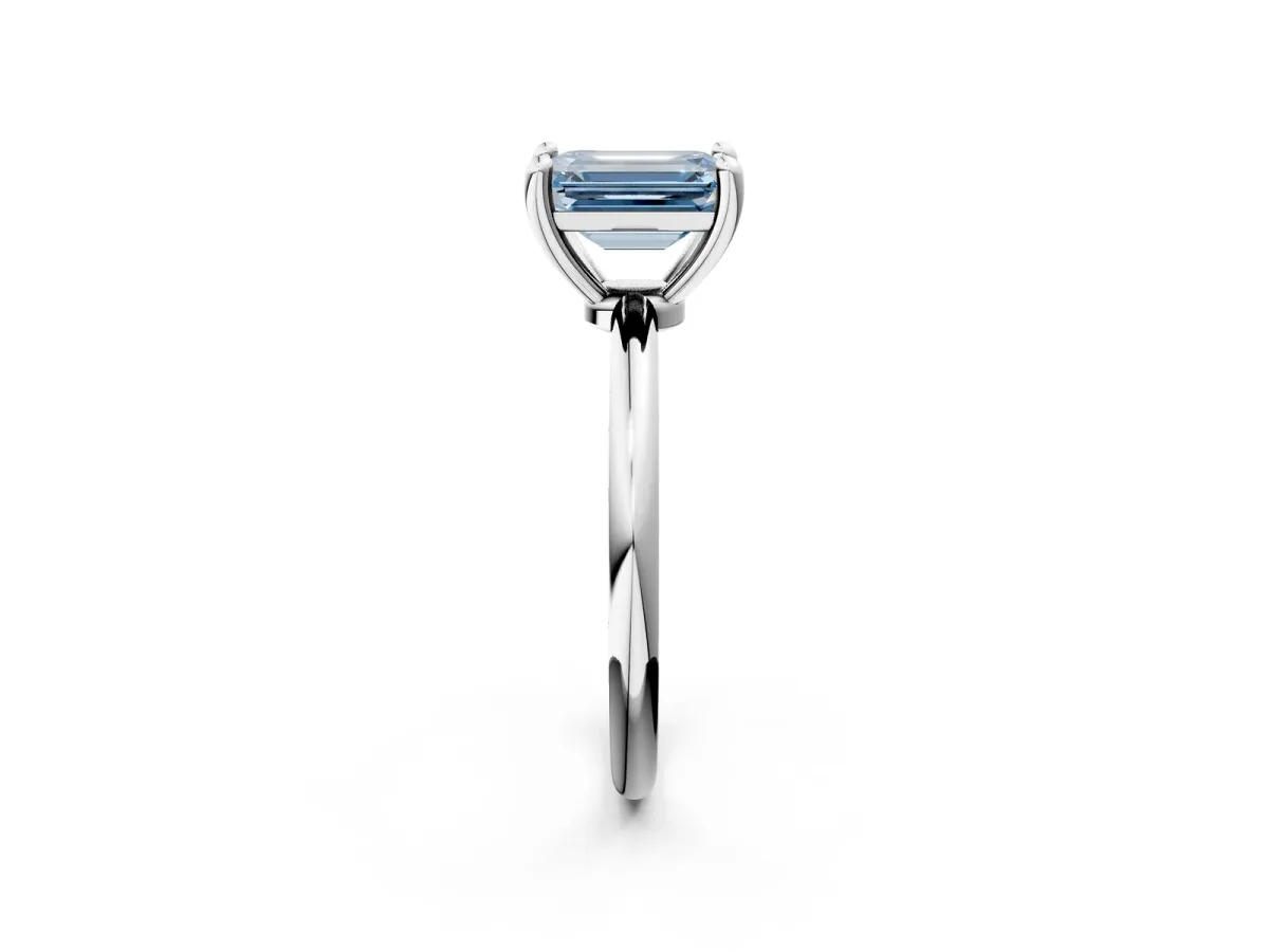 Fancy Blue Emerald Cut Solitaire Diamond Ring with 4-Prong Setting on a Classic Band Silver