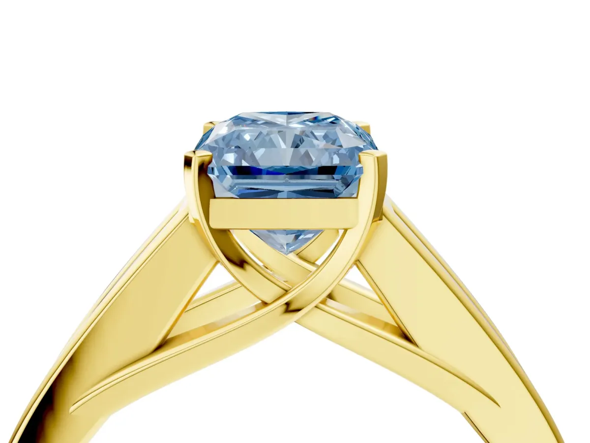 Fancy Blue Radiant Cut Cut Channel Set Solitaire Ring with Four-Prong Setting Yellow gold