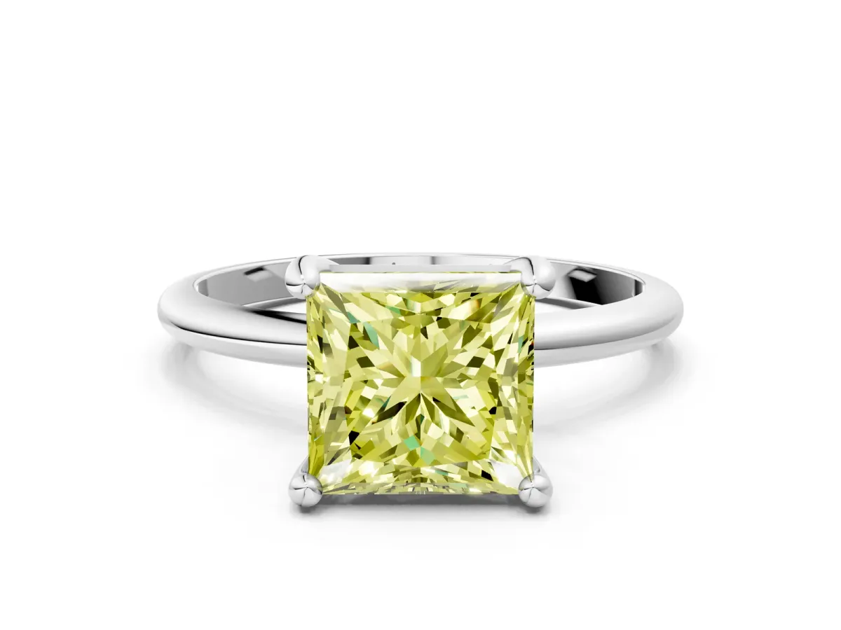 Fancy Yellow Princess Cut Solitaire Diamond Ring with 4-Prong Setting on a Classic Band Silver