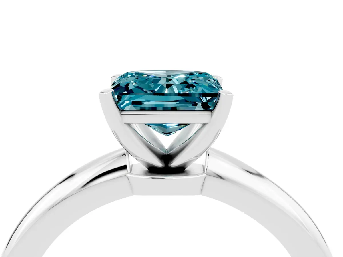 Princess Cut Blue Topaz Solitaire Ring with Six-Prong Setting and Classic Band Silver