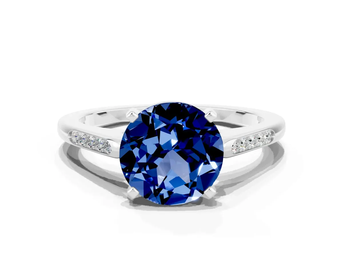 Round Cut Blue Sapphire Solitaire Ring with Channel Set Round Band and Prong Setting Silver