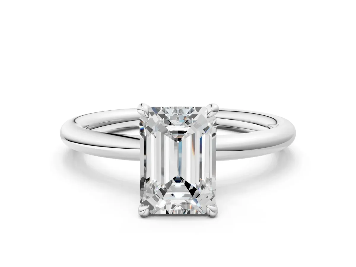 Emerald Cut Diamond Solitaire Ring with Thin Band and Four-Prong Setting White gold