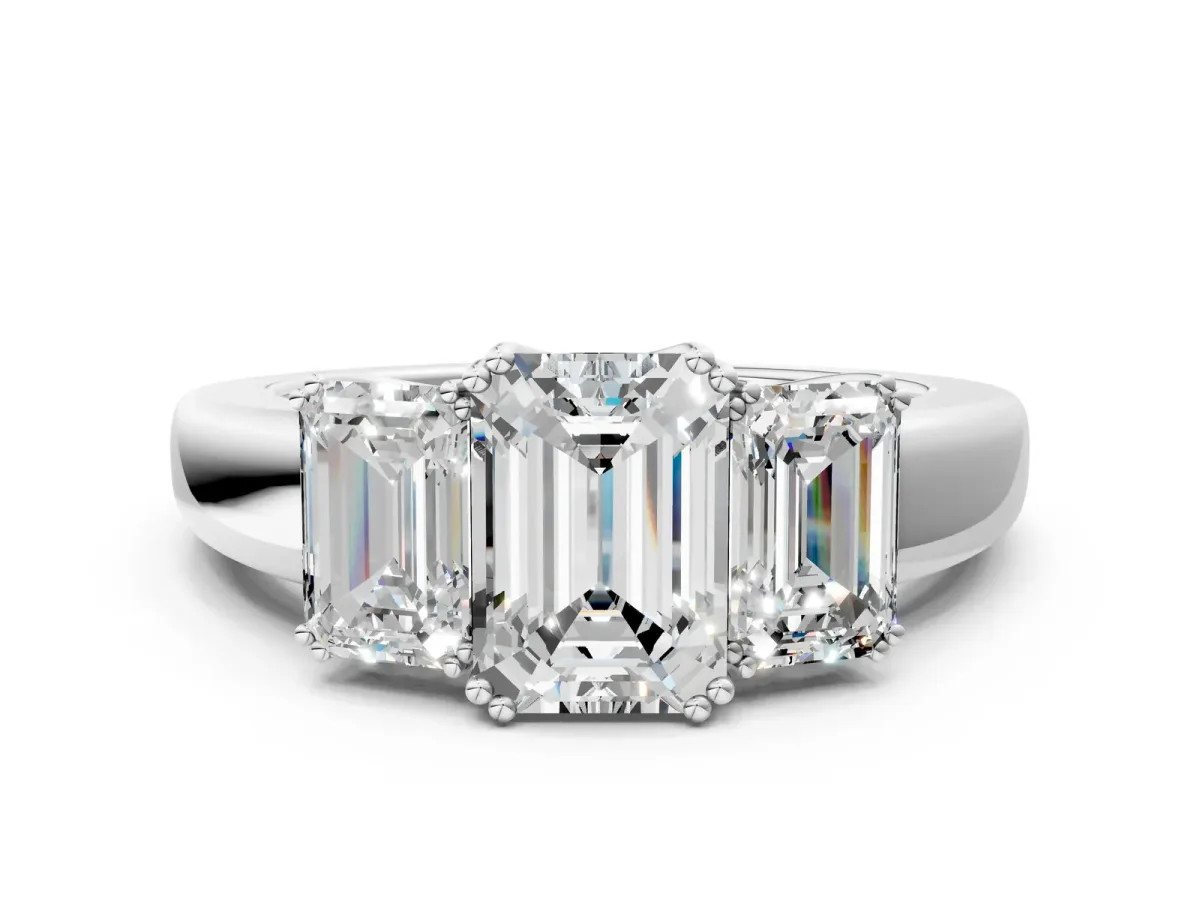Three-Stone Emerald Cut Cut Diamond Ring with Channel Set Band and Four-Prong Setting White gold