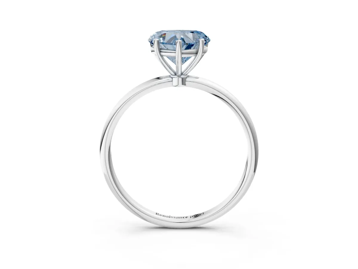 Fancy Blue Heart Cut Cut Solitaire Engagement Ring with Thin Band and Four-Prong Setting Platinum
