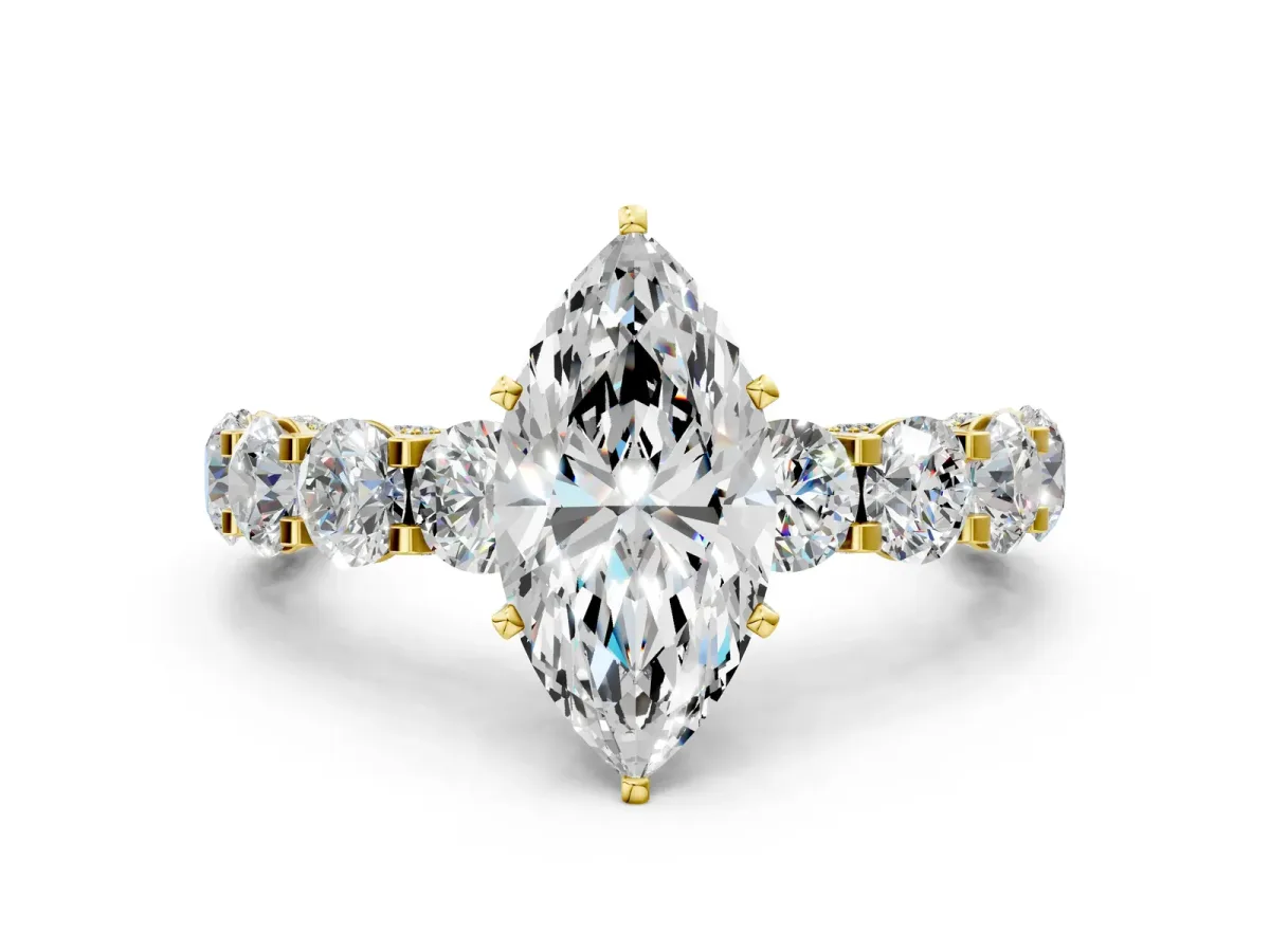 Marquise Cut Diamond Side Stone Engagement Ring with Four-Prong Setting Yellow gold
