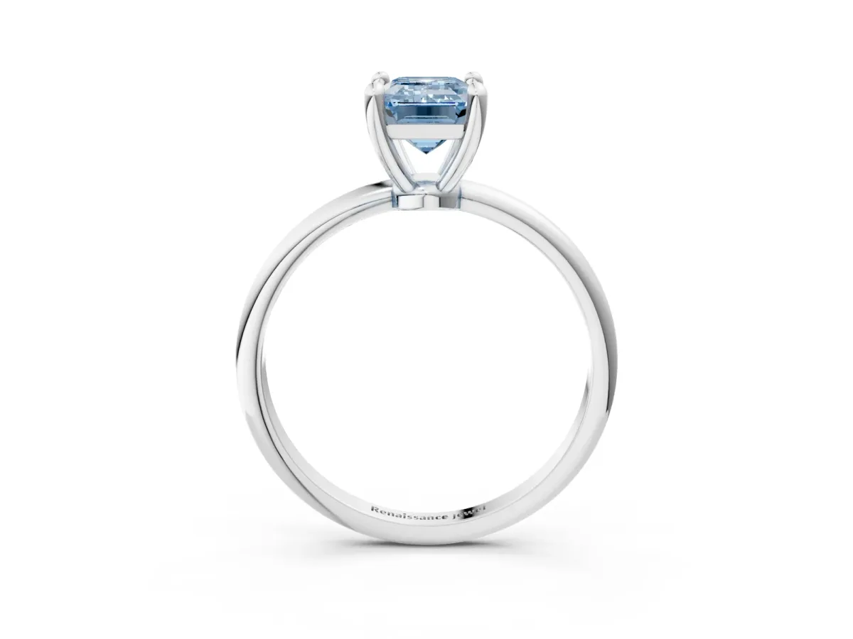 Fancy Blue Emerald Cut Solitaire Diamond Ring with 4-Prong Setting on a Classic Band Silver