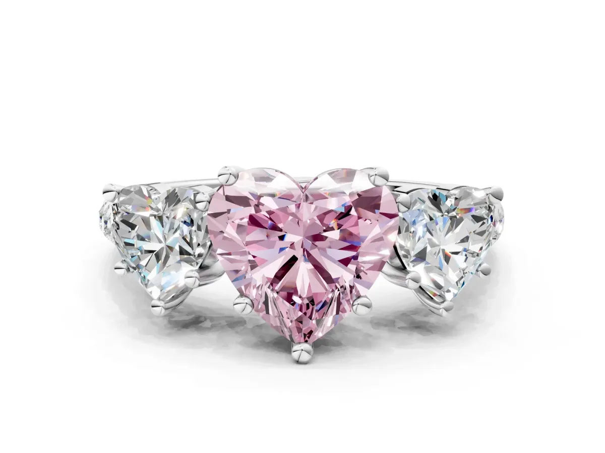 Fancy Pink Three-Stone Heart Cut Diamond Ring with Round Pavé Band and Prong Setting Silver