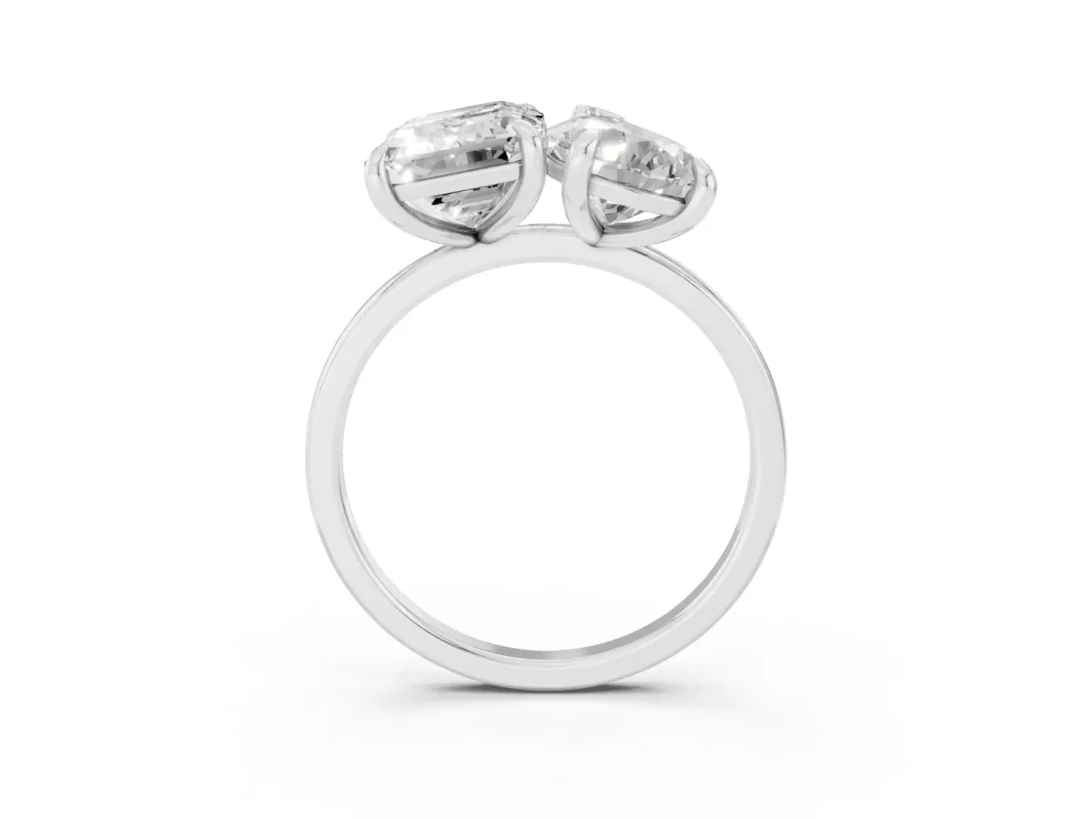 Pear and Emerald Toi Moi Ring with Prong Setting and Plain Band Platinum