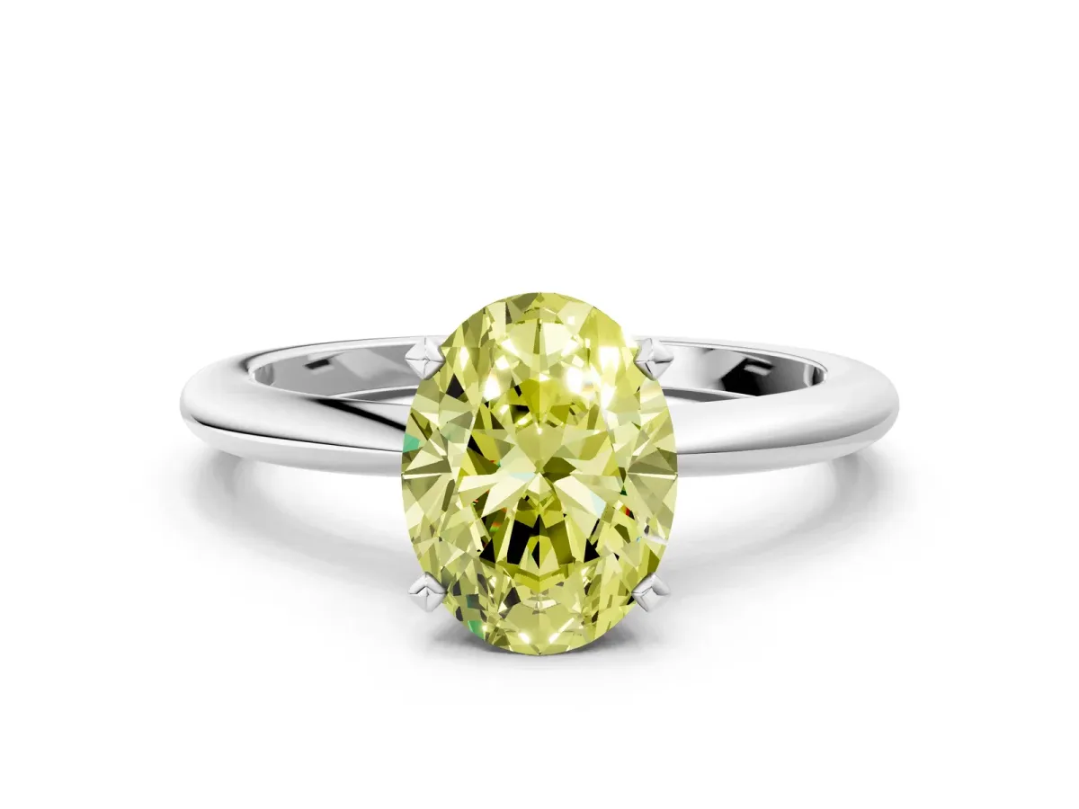 Fancy Yellow Oval Cut Diamond Solitaire Ring with Six-Prong Setting and Classic Band Platinum