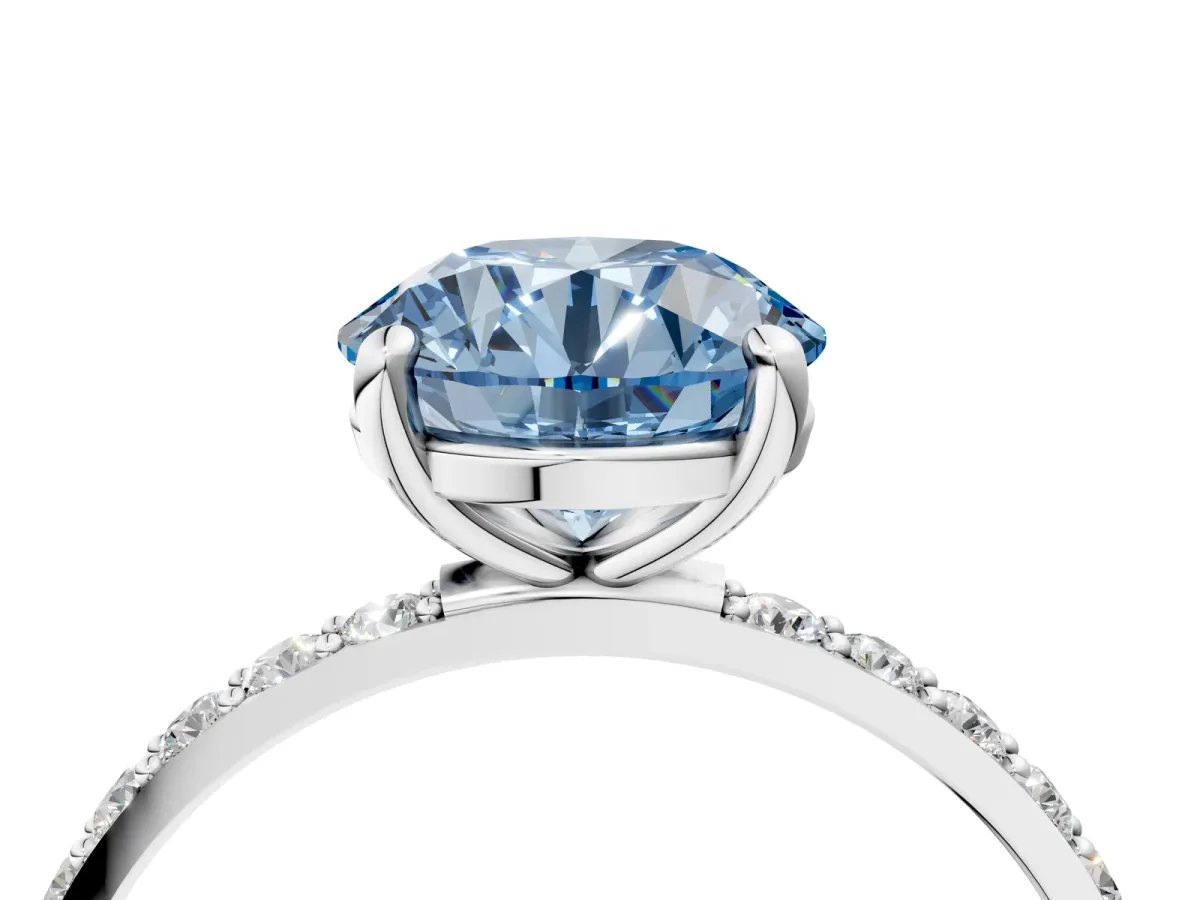 Fancy Blue Round Cut Diamond Solitaire Ring with Round Pavé Band and Prong Setting Platinum