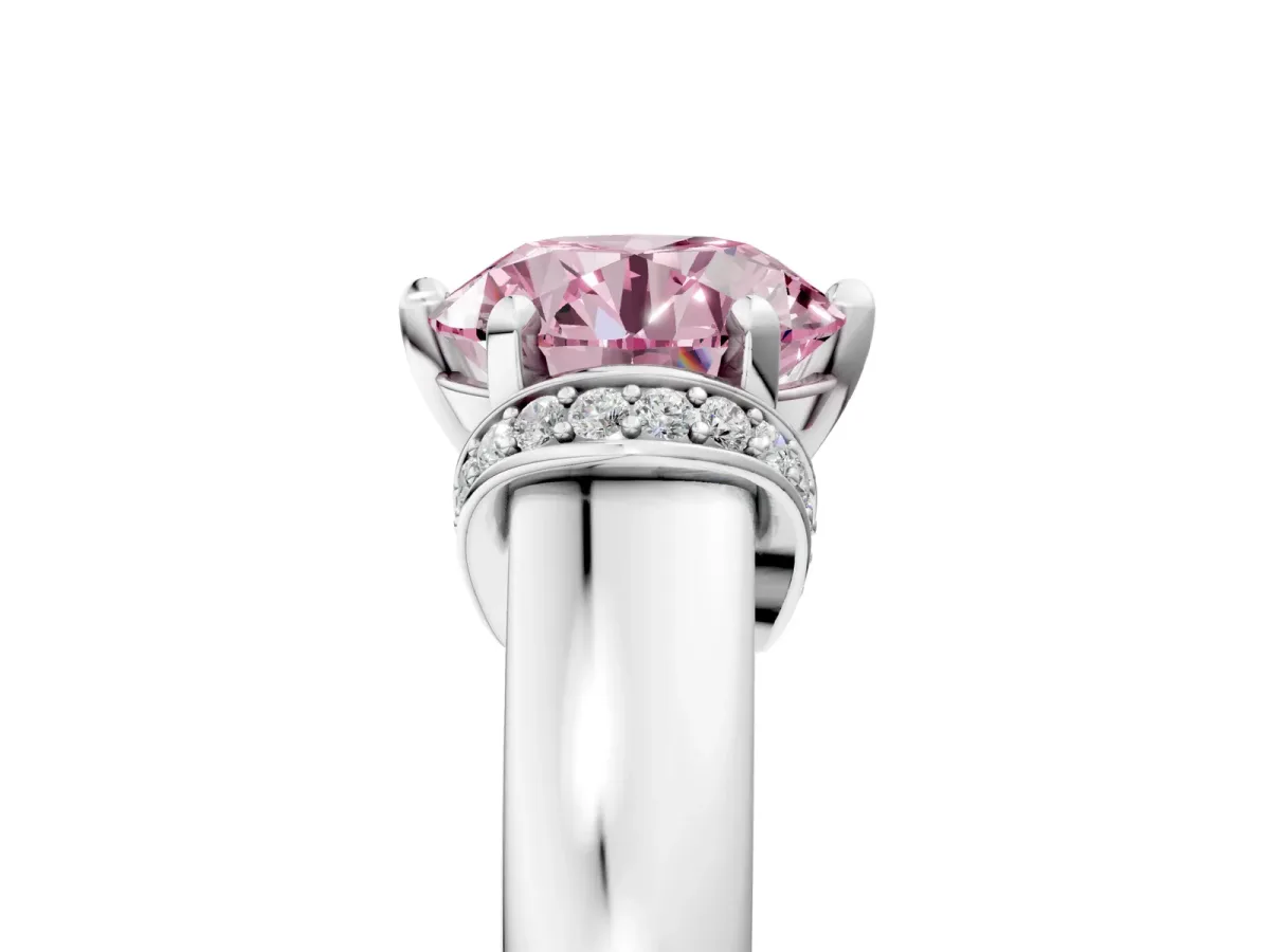 Fancy Pink Round Cut Solitaire Diamond Ring with Pave Band and Six-Prong Setting Silver