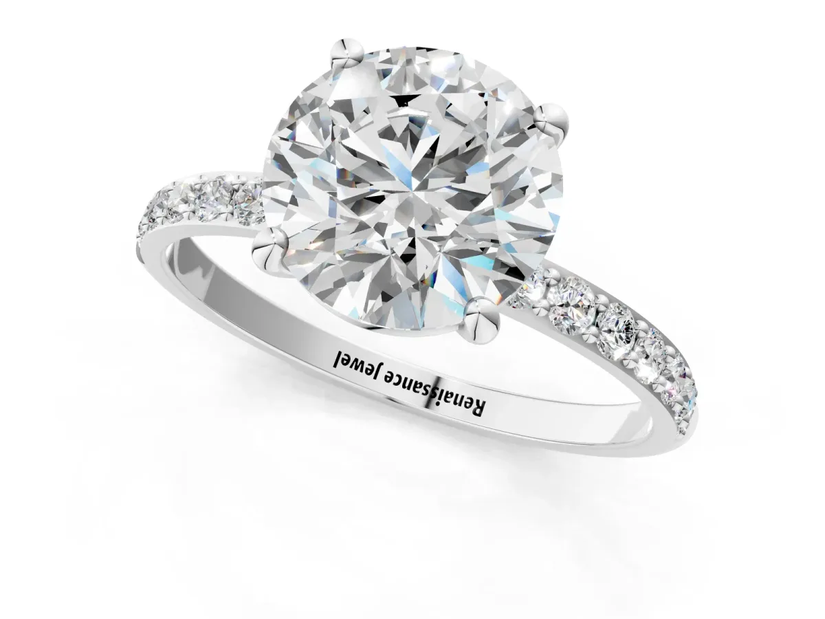 Round Cut Diamond Solitaire Ring with Round Moissanite Pavé Band and Prong Setting Silver