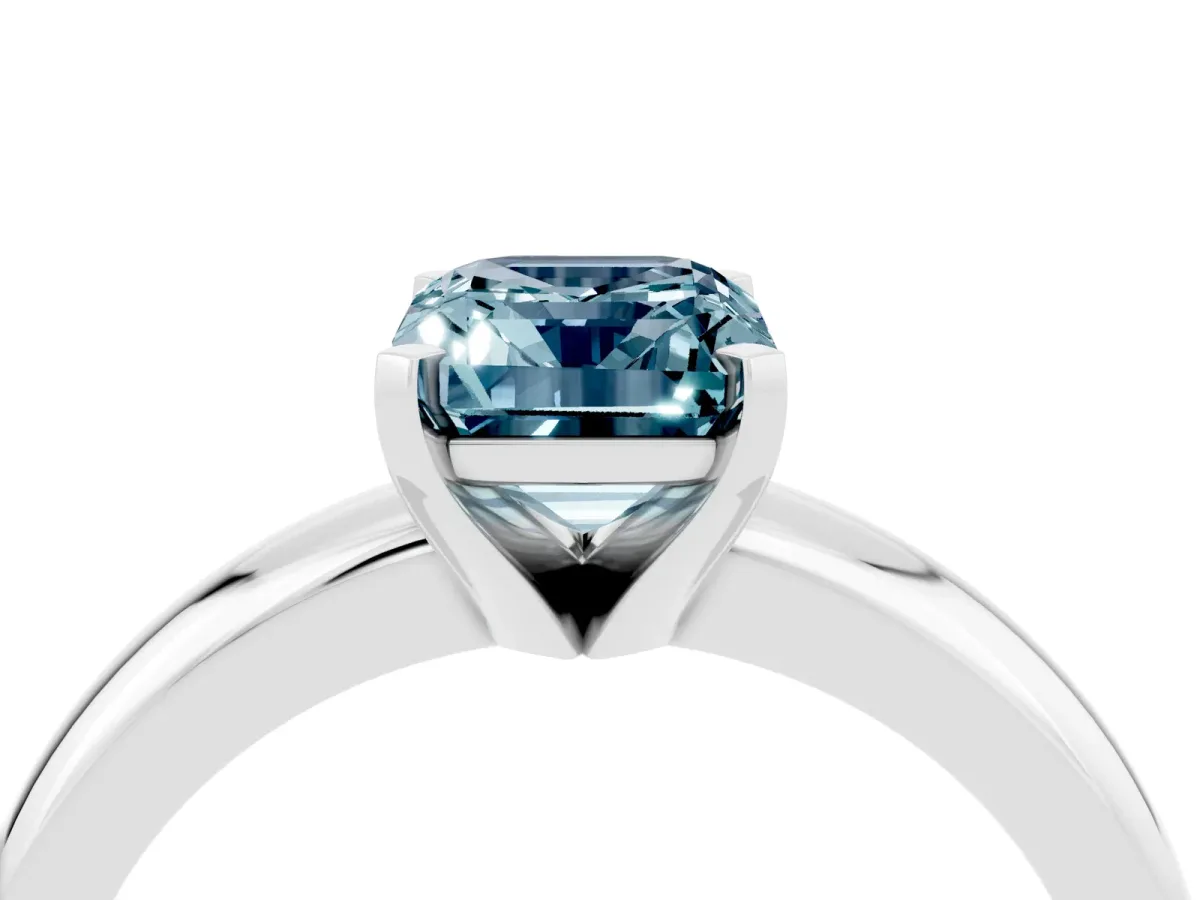 Emerald Cut Aquamarine Solitaire Engagement Ring with Round Band and Four-Prong Setting Silver