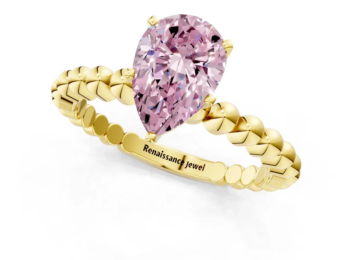 Fancy Pink Pear Cut Diamond Solitaire Ring with Beaded Band and Prong Setting Yellow gold