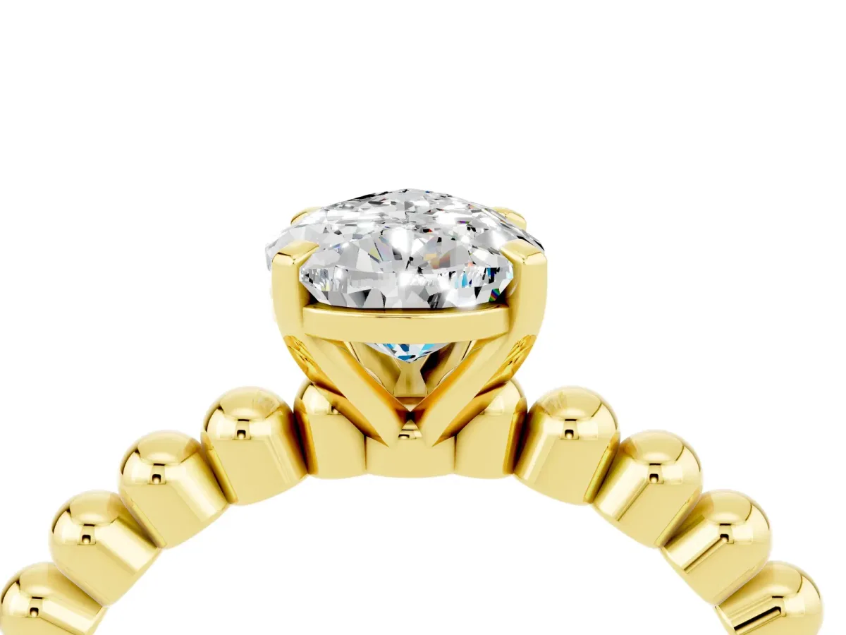 Pear Cut Moissanite Solitaire Ring with Beaded Band and Prong Setting Yellow gold