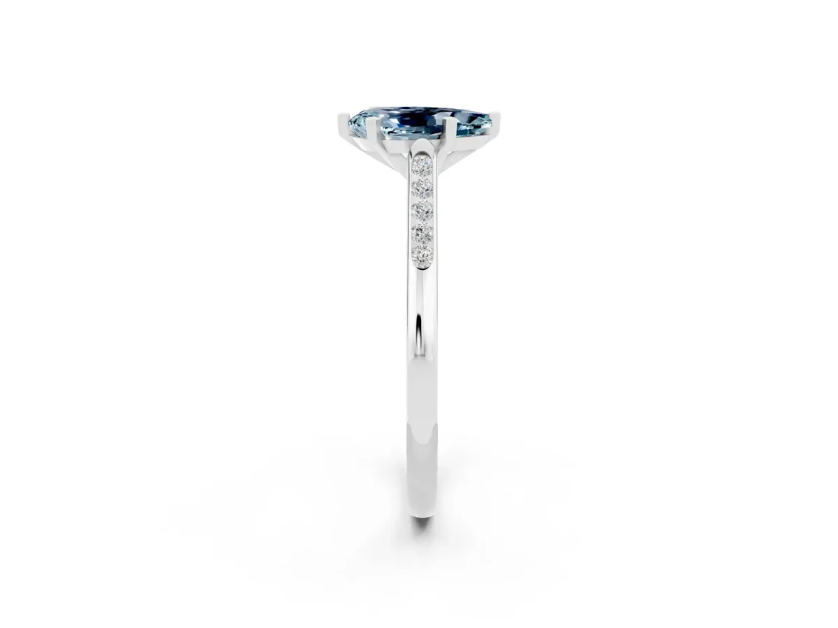 Pear Cut Aquamarine Solitaire Ring with Channel Set Round Band and Prong Setting Silver
