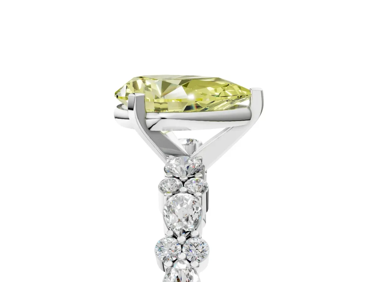 Fancy Yellow Pear Cut Diamond Side Stone Solitaire Ring with Round and Four-Prong Setting White gold