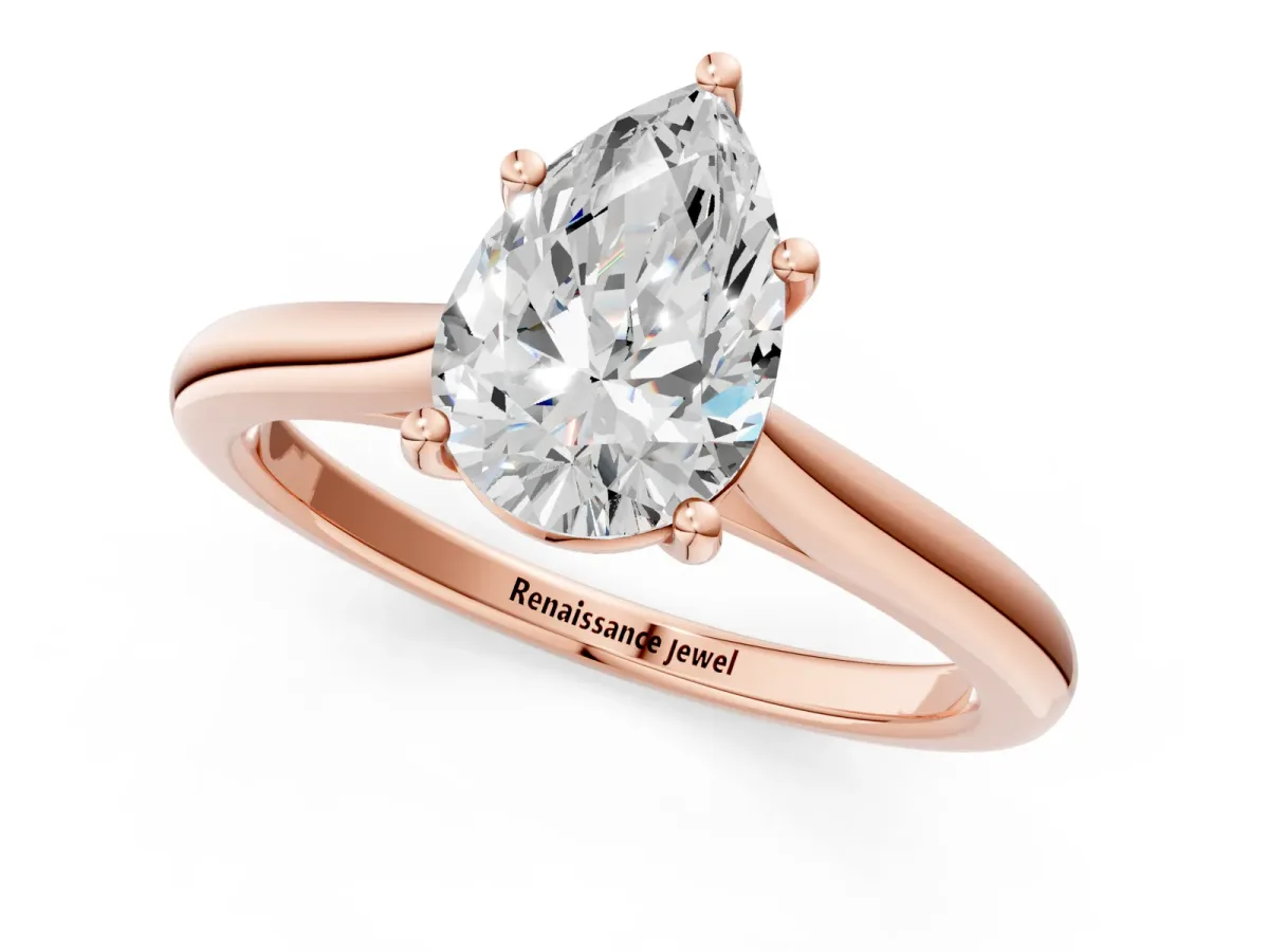Pear Cut Cut Solitaire Ring with Cathedral Band and Four-Prong Setting Rose gold