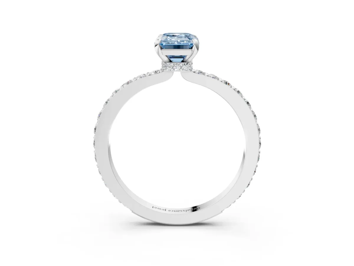 Fancy Blue Emerald Cut Diamond Solitaire Engagement Ring with Pavé Band and Four-Prong Setting Silver