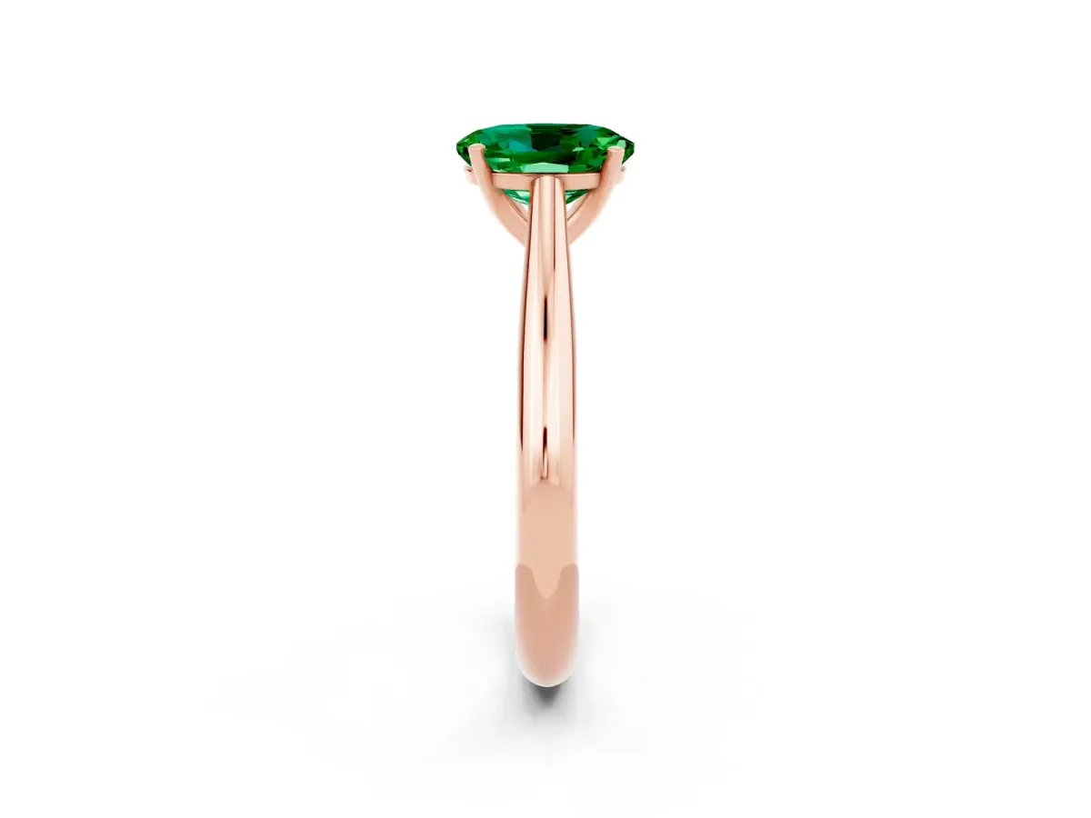 Oval Cut Emerald Solitaire Engagement Ring with Cathedral Setting and Four-Prong Mount Rose gold