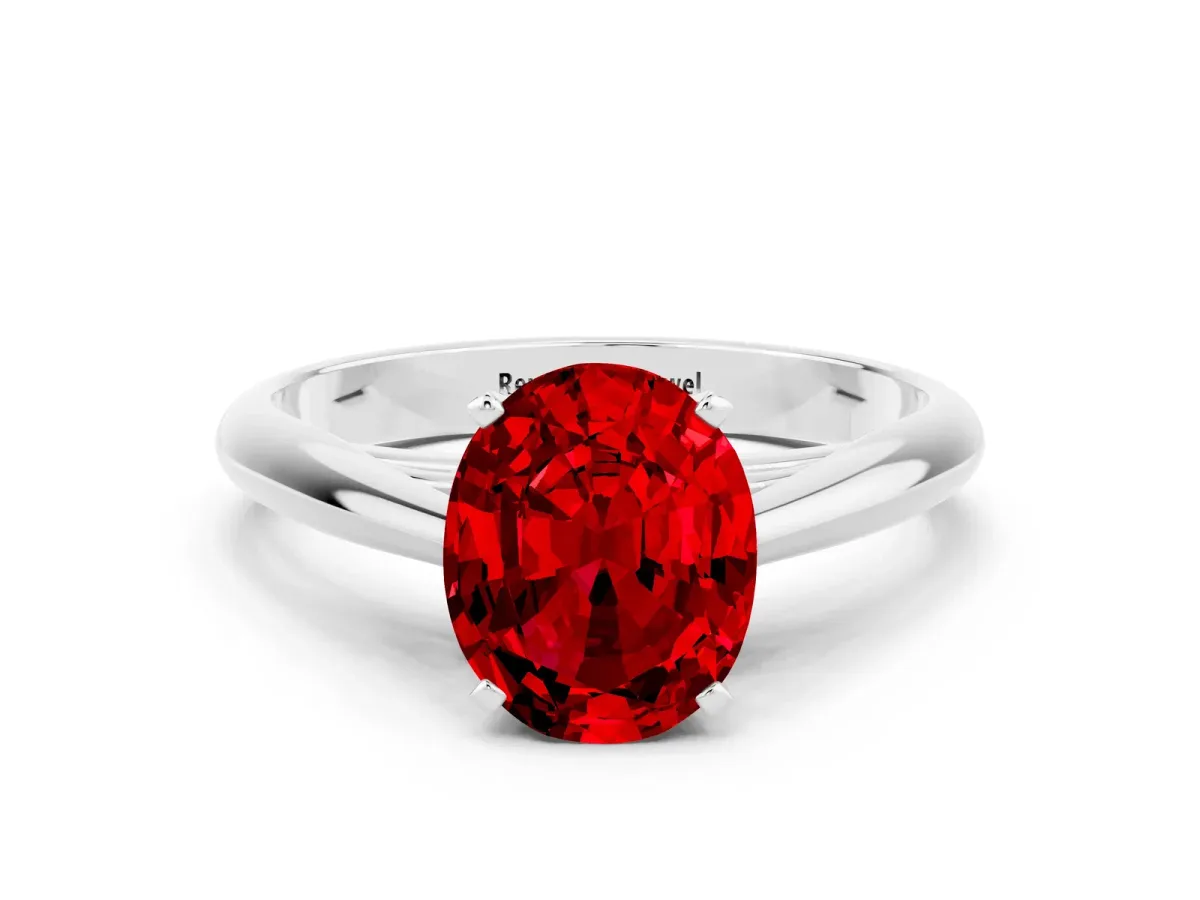 Oval Cut Ruby Solitaire Engagement Ring with Cathedral Setting and Four-Prong Mount White gold