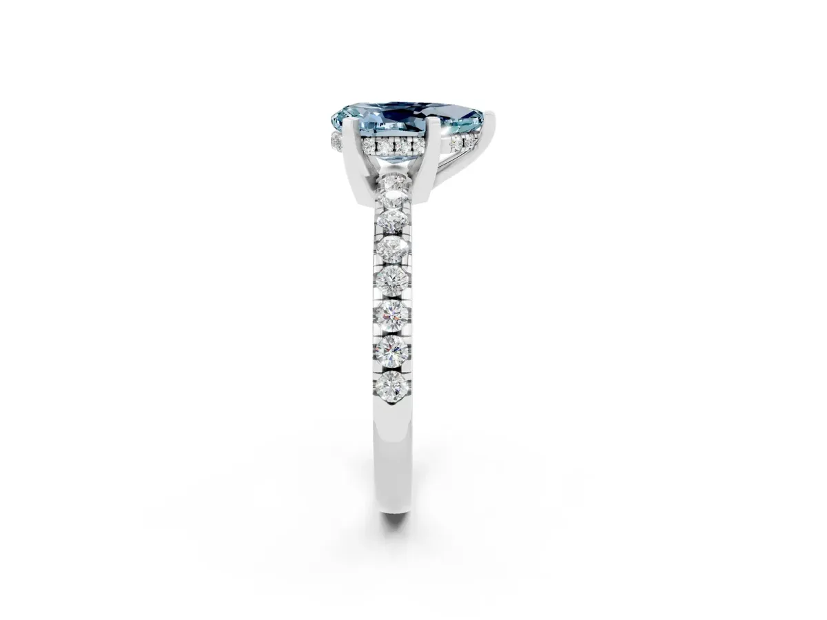 Pear Cut Aquamarine Solitaire Ring with Round Pavé Band and Four-Prong Setting Silver