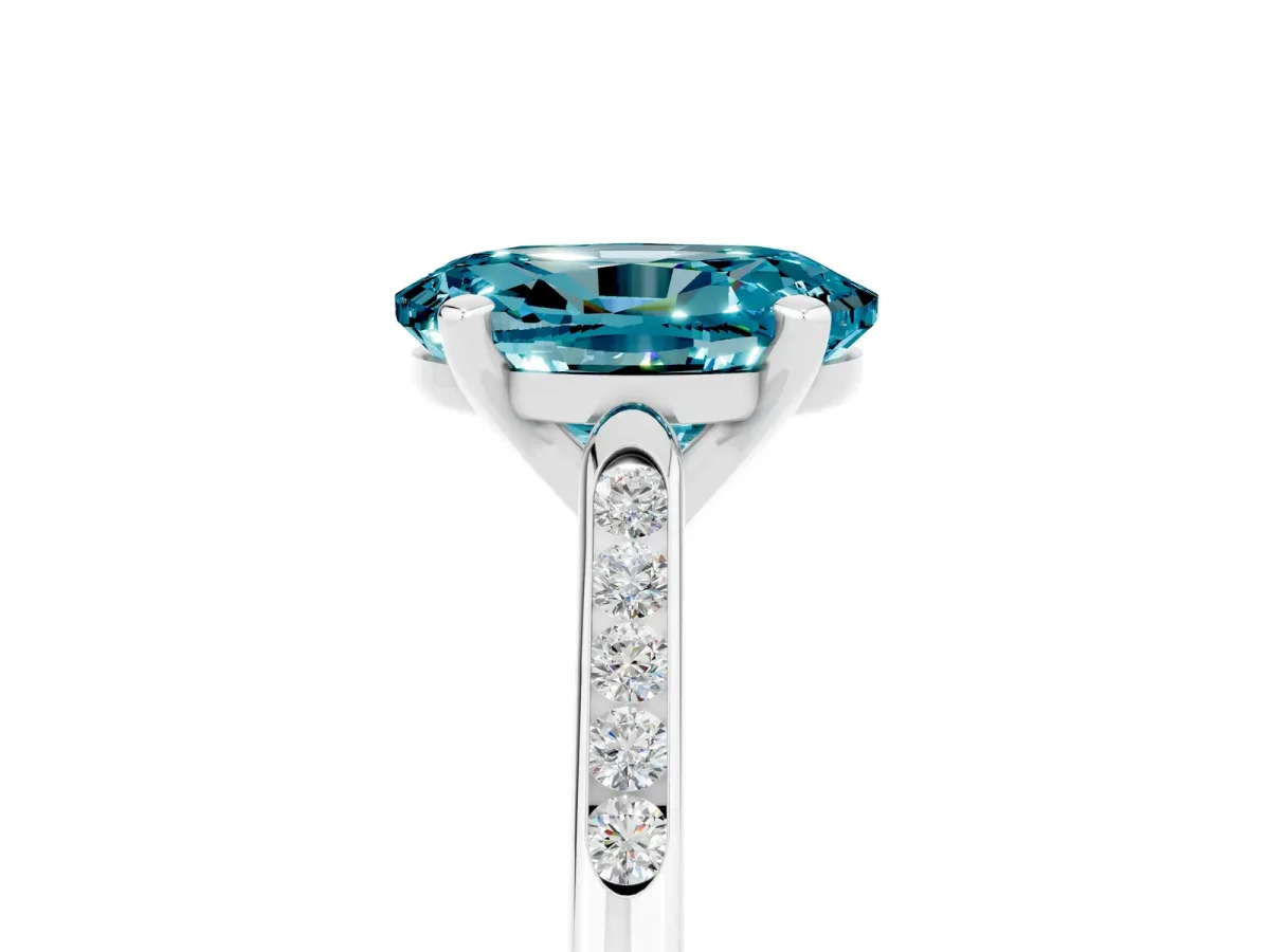 Oval Cut Blue Topaz Solitaire Ring with Channel Set Round Band and Prong Setting Silver