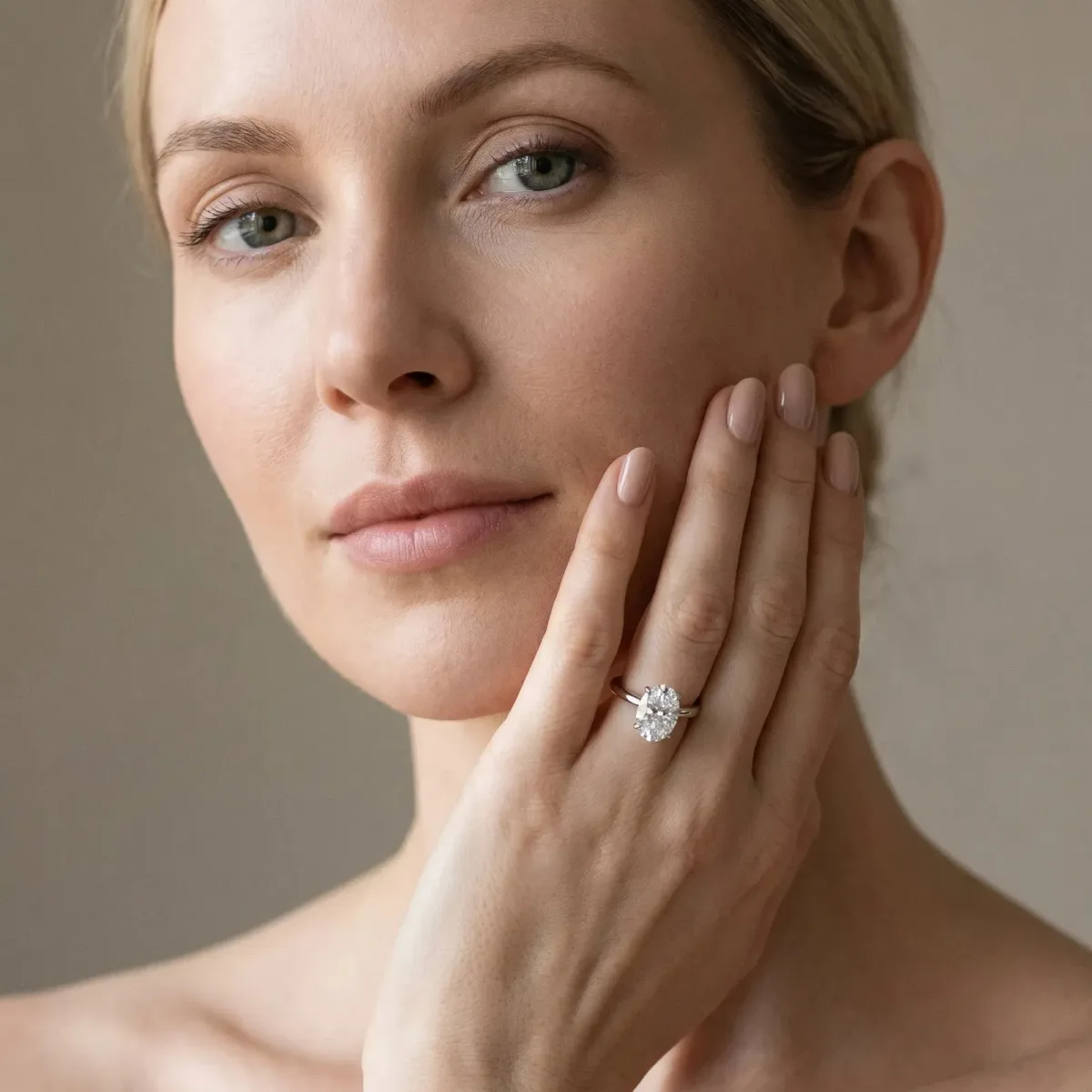 Oval Cut Diamond Solitaire Engagement Ring with Classic Band and Four-Prong Setting Silver