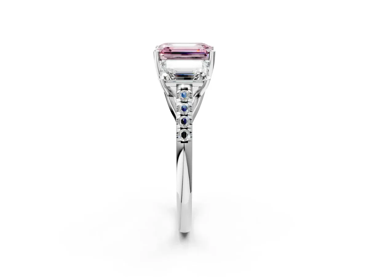 Fancy Pink Three-Stone Emerald Cut Diamond Ring with Round Pavé Band and Prong Setting Platinum