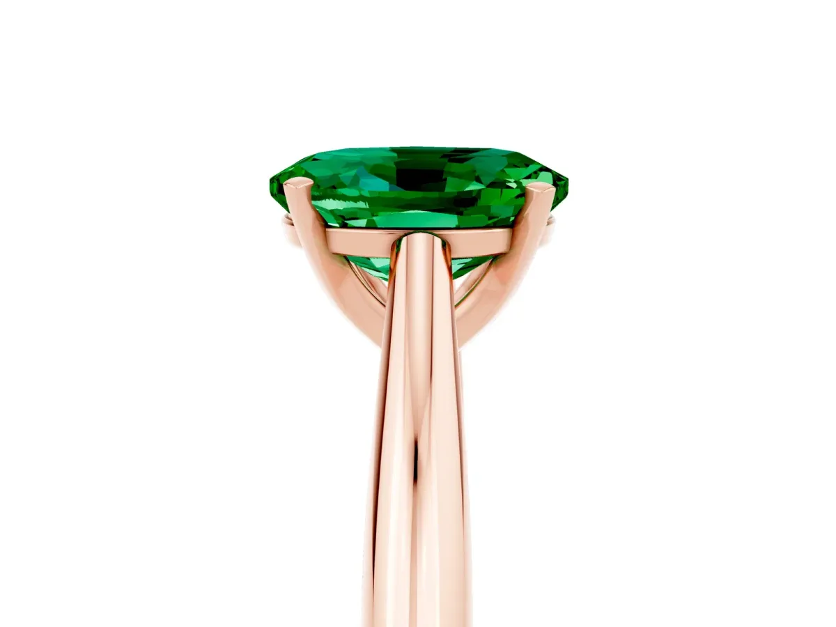 Oval Cut Emerald Solitaire Engagement Ring with Cathedral Setting and Four-Prong Mount Rose gold