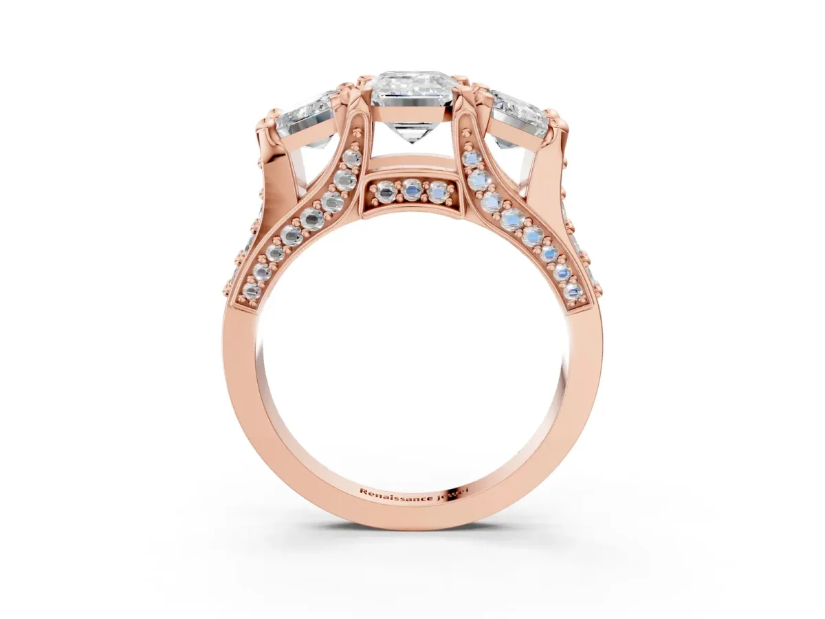 Emerald Cut Diamond Three-Stone Ring with Channel Set Band and Four-Prong Setting Rose gold