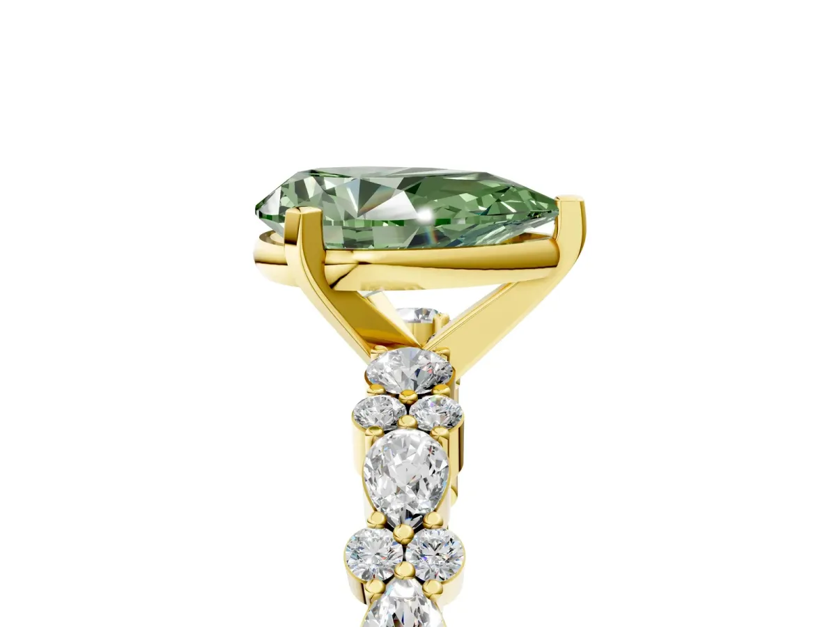 Fancy Green Pear Cut Diamond Side Stone Solitaire Ring with Round and Four-Prong Setting Yellow gold