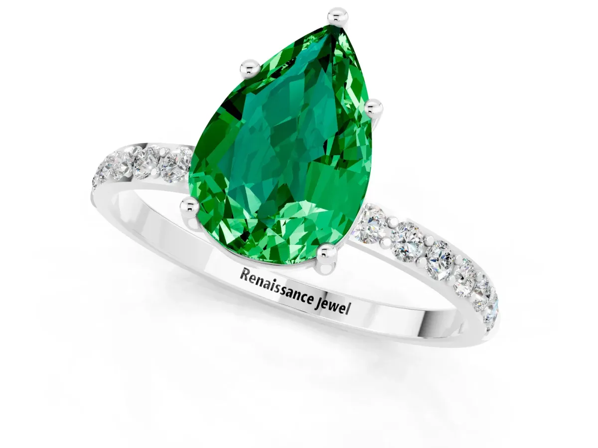 Pear Cut Emerald Solitaire Ring with Round Pavé Band and Prong Setting White gold