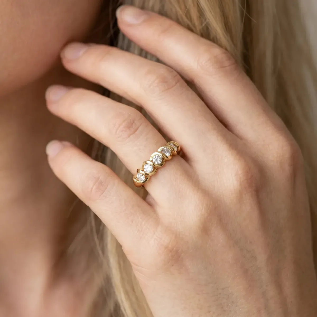 Round Diamond Eternity Band with Twist Prong Setting Yellow gold