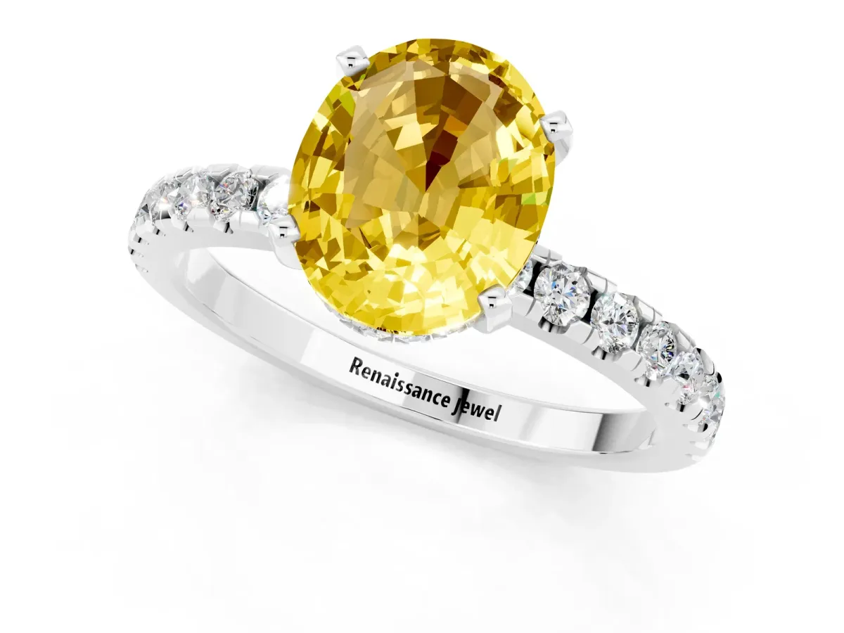 Oval Cut Yellow Sapphire Solitaire Ring with Round Pavé Band and Four-Prong Setting Silver
