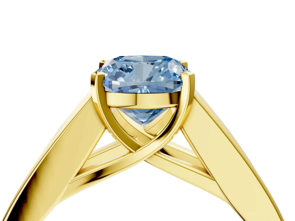 Fancy Blue Cushion Cut Cut Channel Set Solitaire Ring with Four-Prong Setting Yellow gold