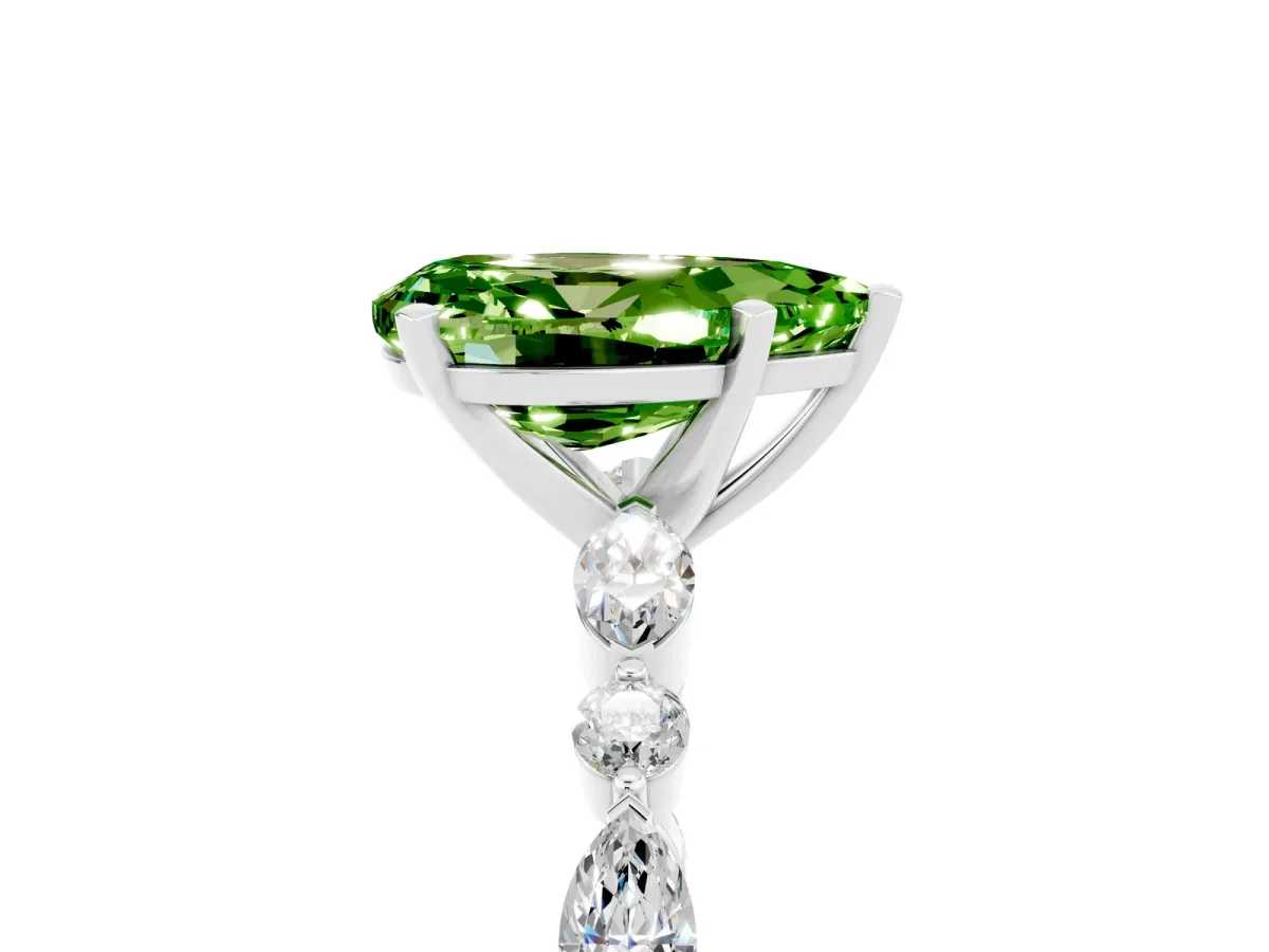 Pear Cut Peridot Ring with Marquise and Round Side Stones and Four-Prong Setting Silver