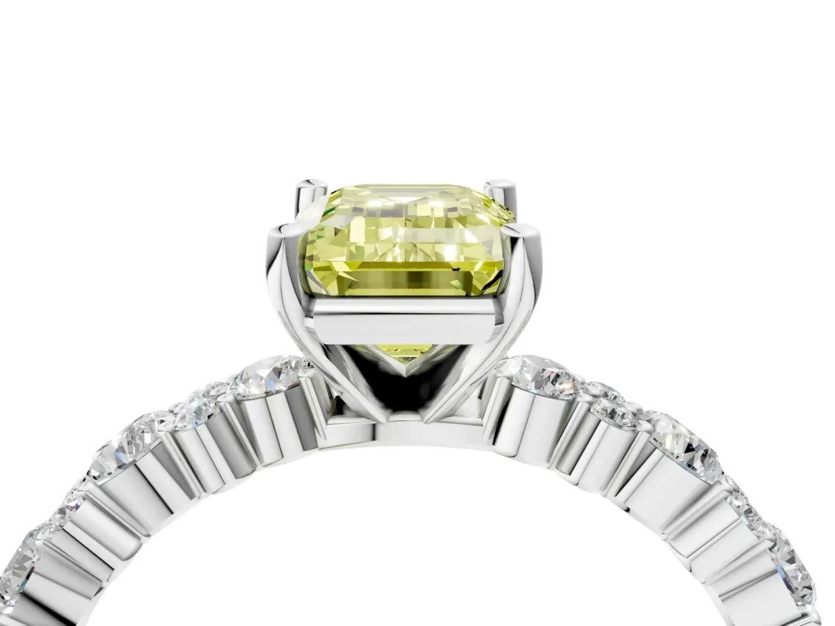 Fancy Yellow Emerald Cut Diamond Side Stone Solitaire Ring with Round and Four-Prong Setting Platinum