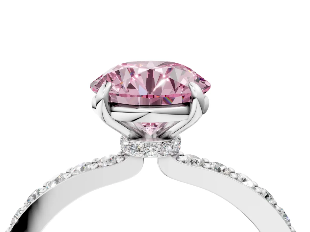 Fancy Pink Round Cut Diamond Solitaire Engagement Ring with Pavé Band and Four-Prong Setting Silver