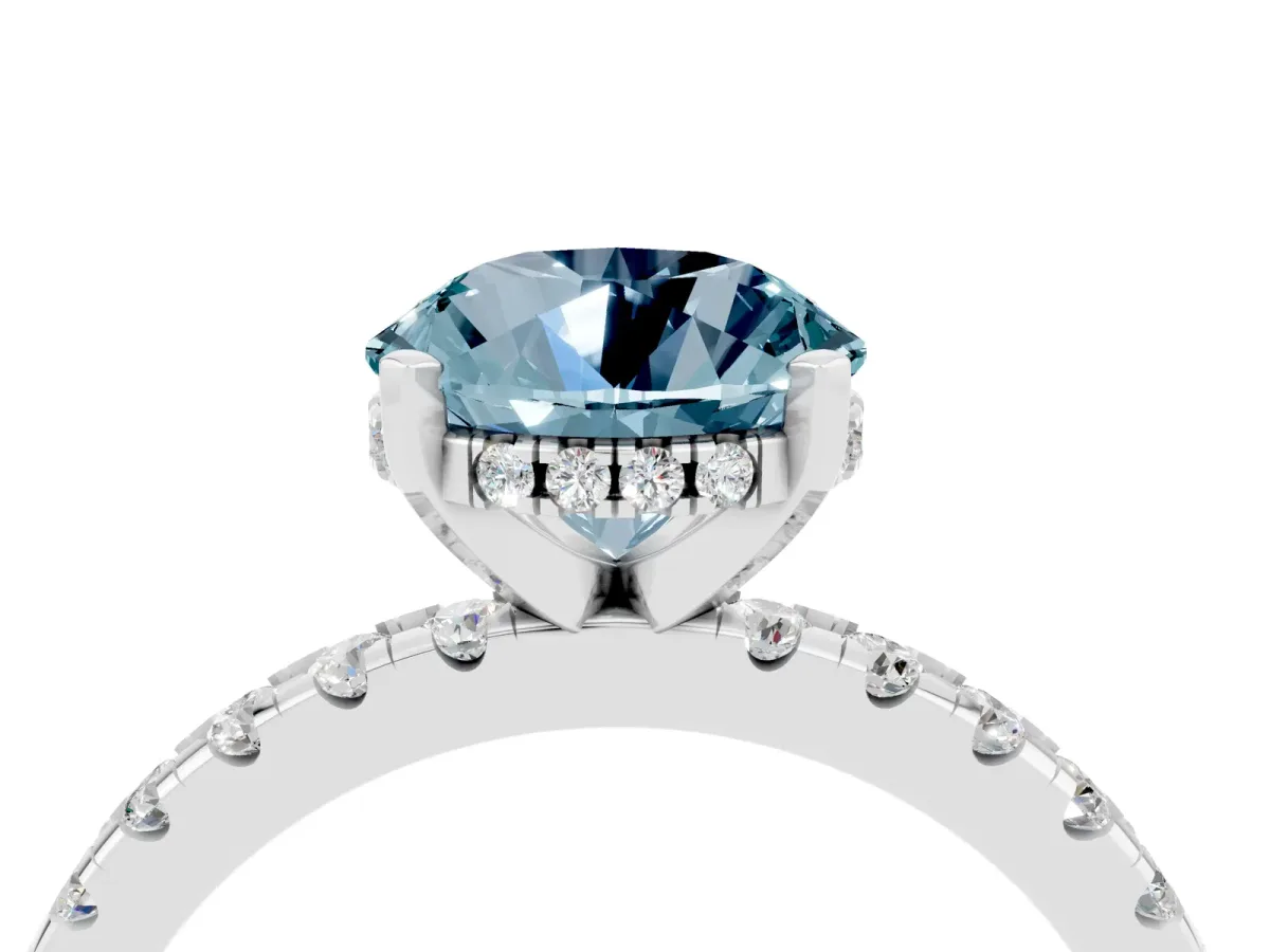 Round Cut Aquamarine Solitaire Ring with Round Pavé Band and Four-Prong Setting Silver