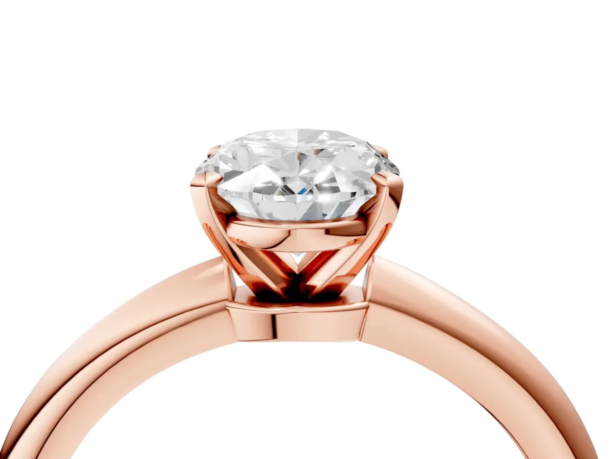 Oval Cut Diamond Solitaire Ring with Six-Prong Setting and Classic Band Rose gold