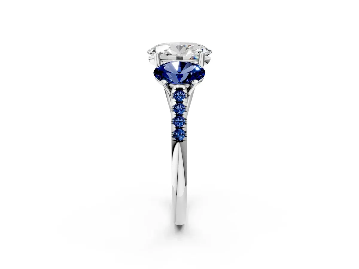 Three-Stone Oval Cut Diamond Ring with Round Blue Sapphire Pavé Band and Prong Setting Silver