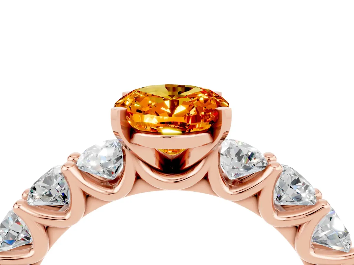 Oval Cut Citrine Prong Setting with Side Stones on a Pave Band Rose gold