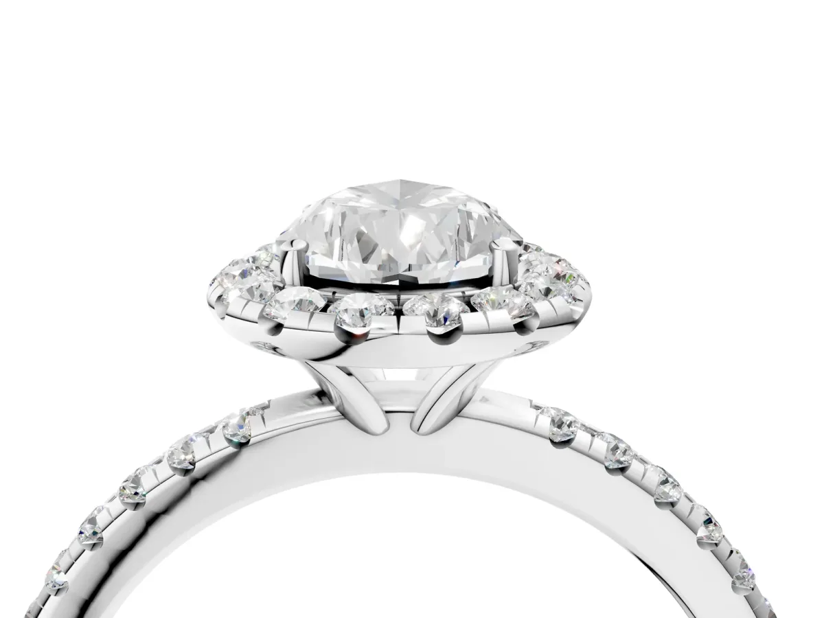 Pear Cut Diamond Halo Ring with Round Pavé Band and Prong Setting Platinum